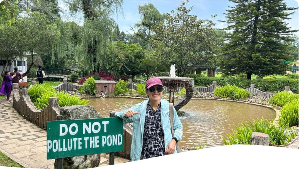 This is inside a park, where the signboard says do not pollute the pond