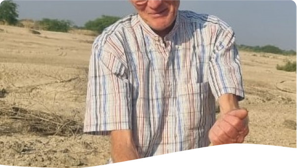 Pieter playing with sand