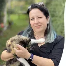 Researcher with a cat