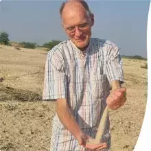 Pieter playing with sand